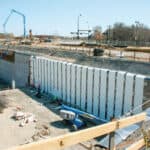 A large construction site project utilizing wall drains for multi-level runoff