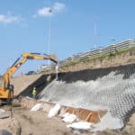 AquaBlok Sealing System being applied to a slope