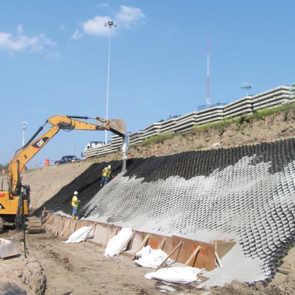 AquaBlok Sealing System being applied to a slope