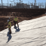 Installing a geosynthetics clay liner near an industrial plant