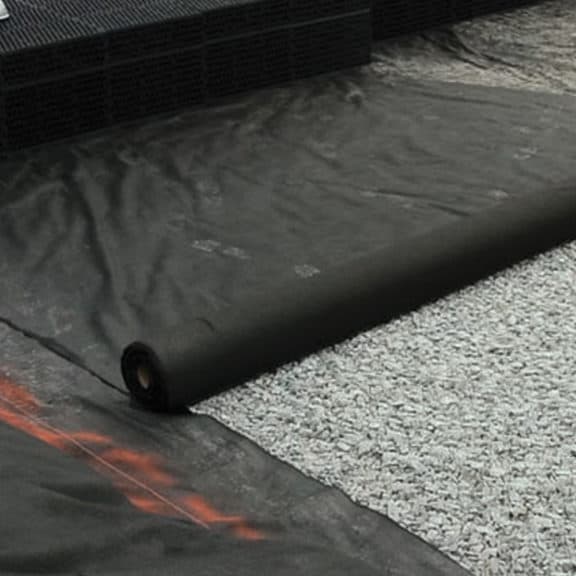 Installing lightweight nonwoven geotextile for high flow application
