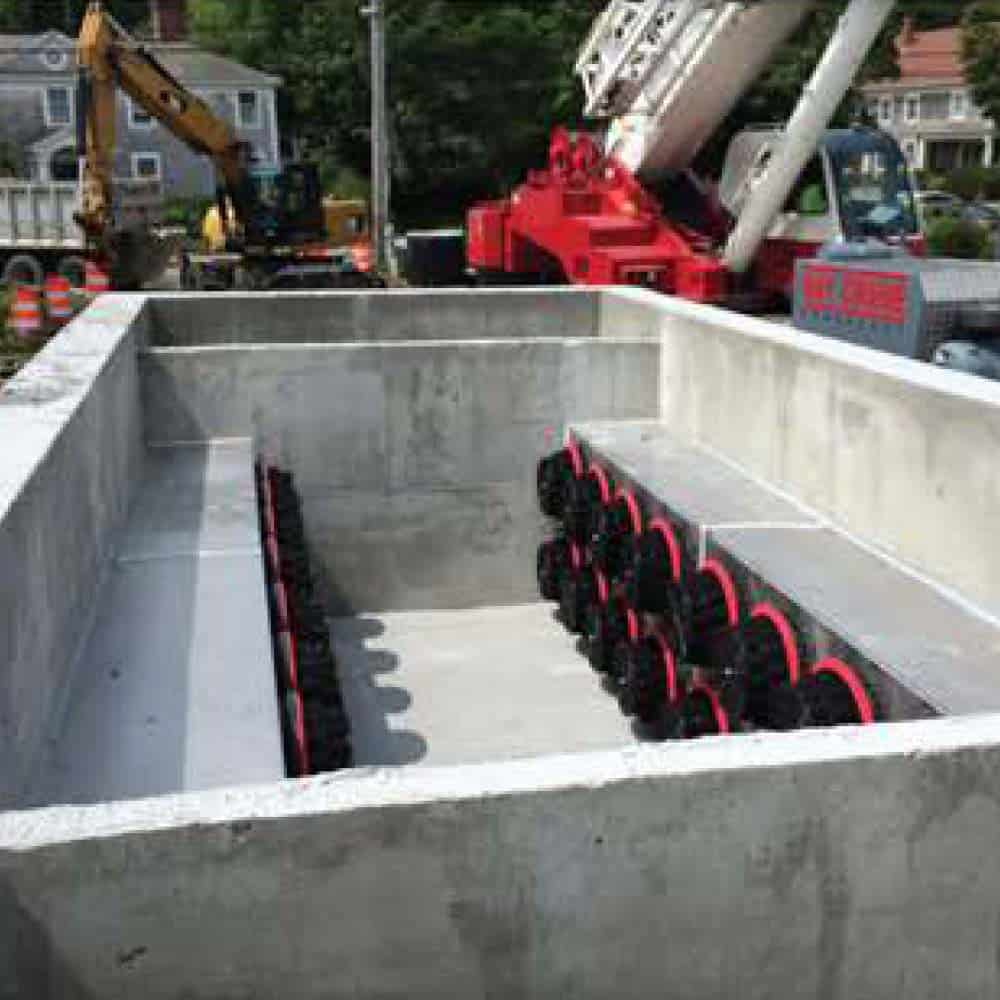 A large stormwater vault on a construction site with multiple cartridge filter devices