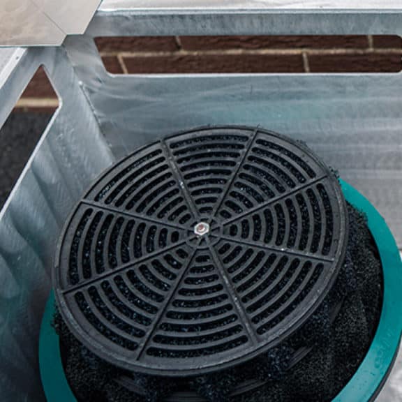 A cartridge filter in a StormBasin that captures and treats stormwater pollutants