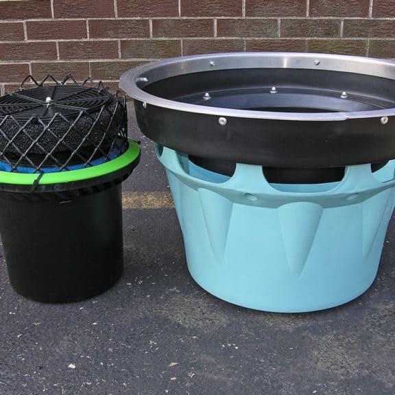 Large circular cartridge device for capturing and treating stormwater runoff