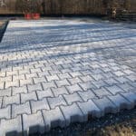 Large grid of PowerBLOCK Permeable Pavers on an urban construction site