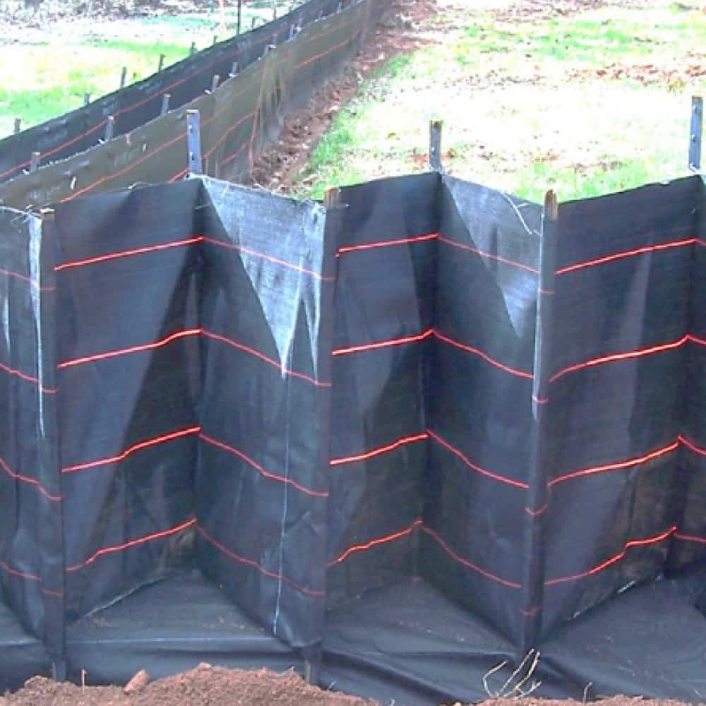 Installation of CRAFS silt fence at a construction site