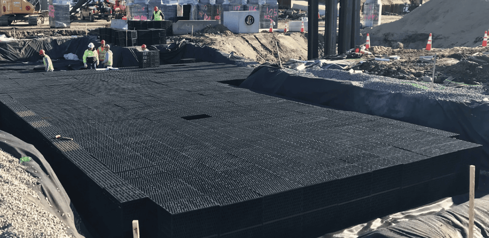 Installation of the R-Tank, a subsurface stormwater storage device.